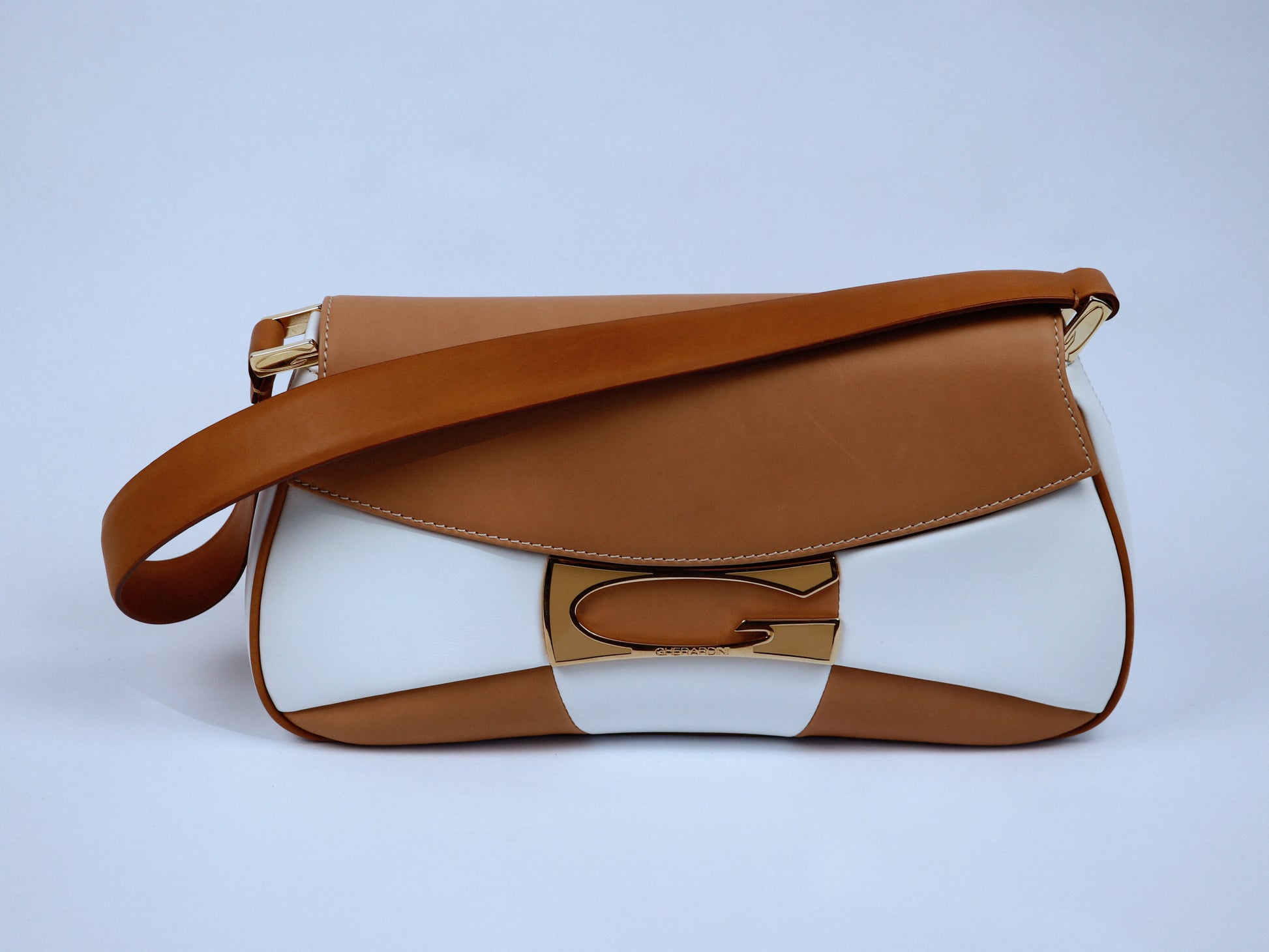 Geometric cut shoulder bag