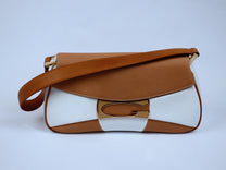 Geometric cut shoulder bag