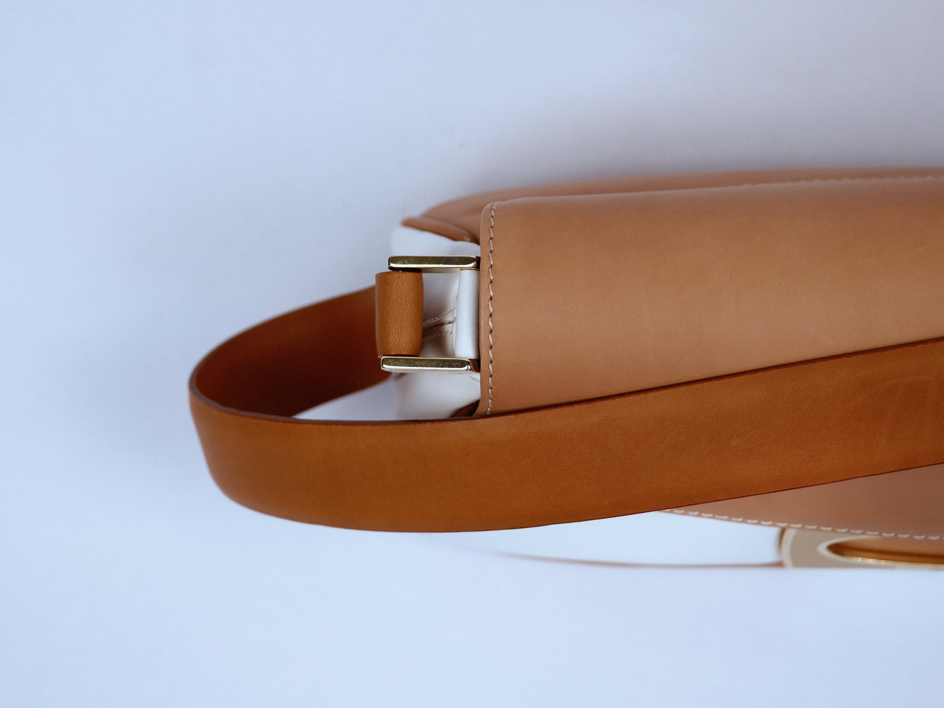 Geometric cut shoulder bag