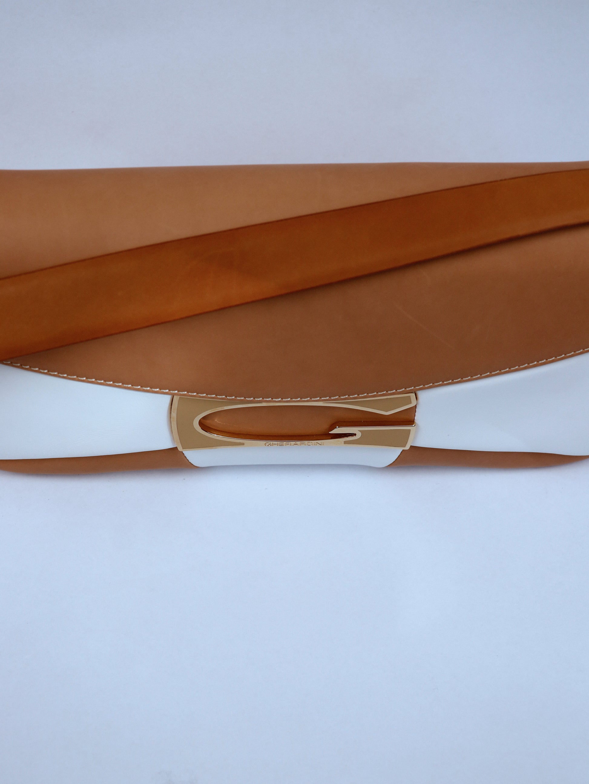 Geometric cut shoulder bag