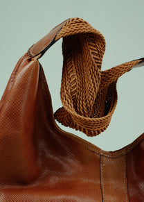 Hobo bag with woven handle
