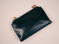 Clutch with jewel closure