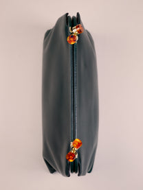 Clutch with jewel closure