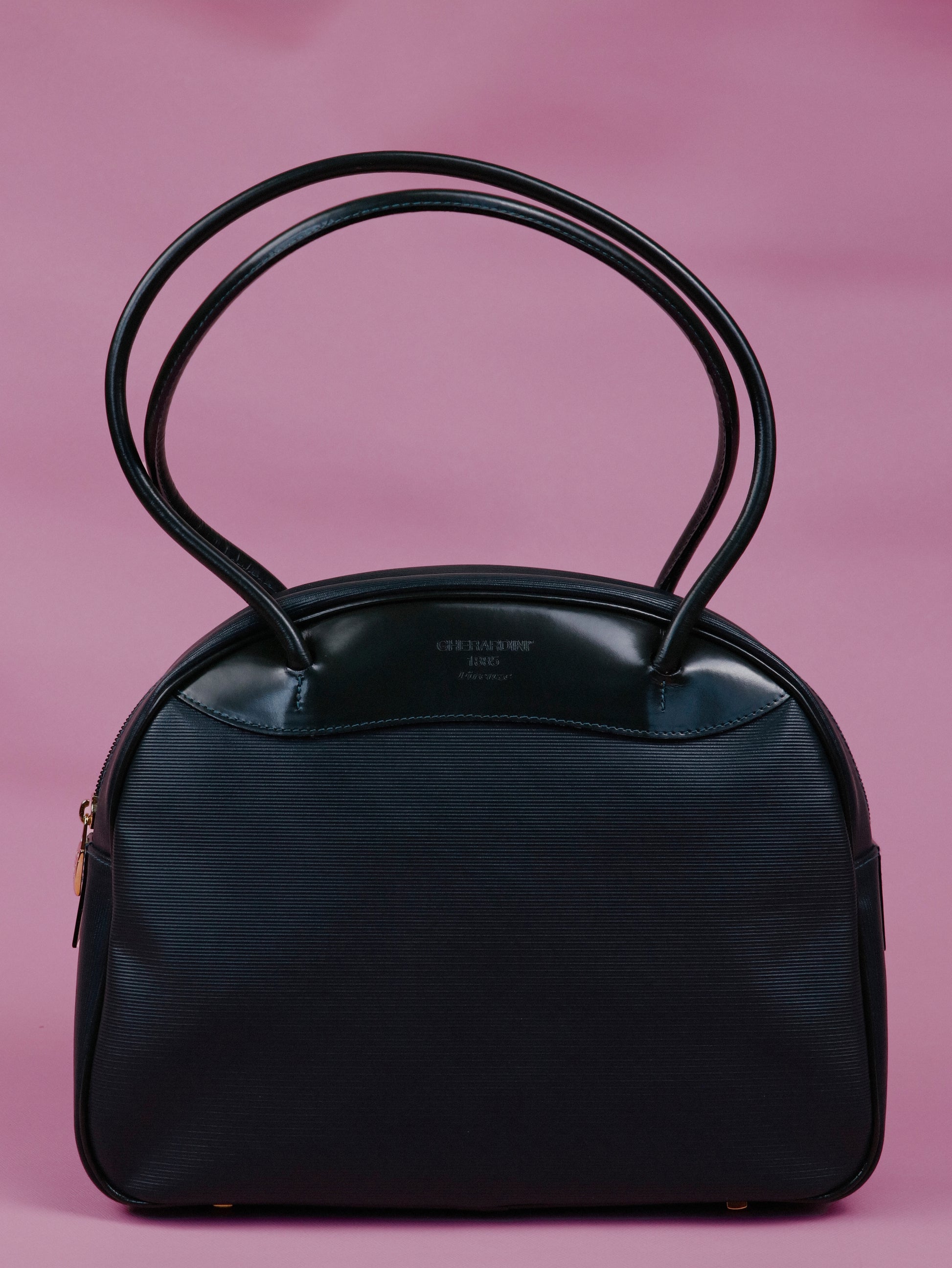 Handbag in striped fabric