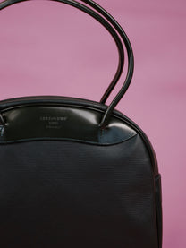 Handbag in striped fabric