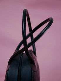 Handbag in striped fabric