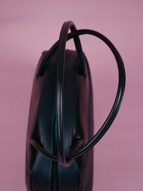 Handbag in striped fabric