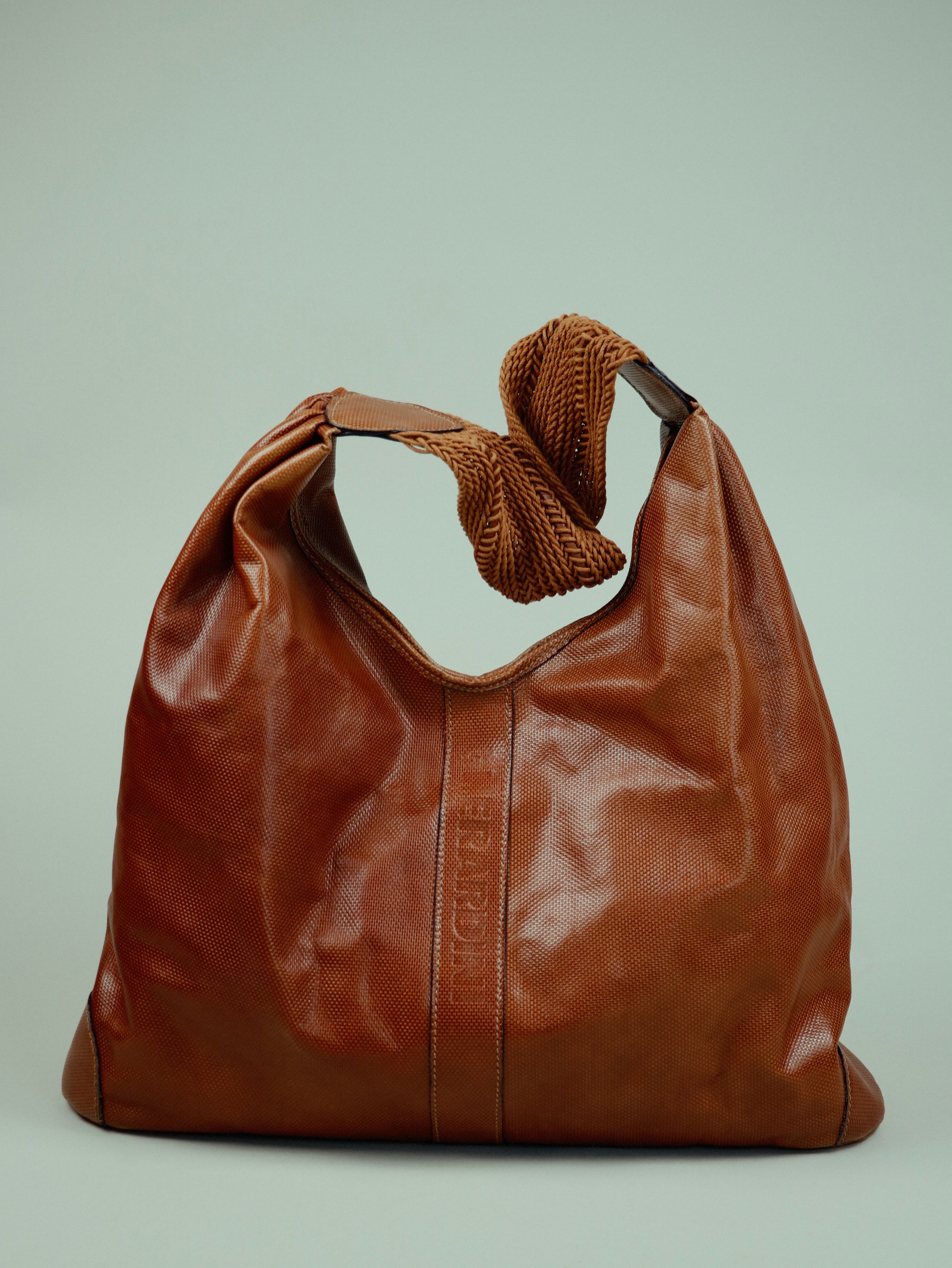 Hobo bag with woven handle