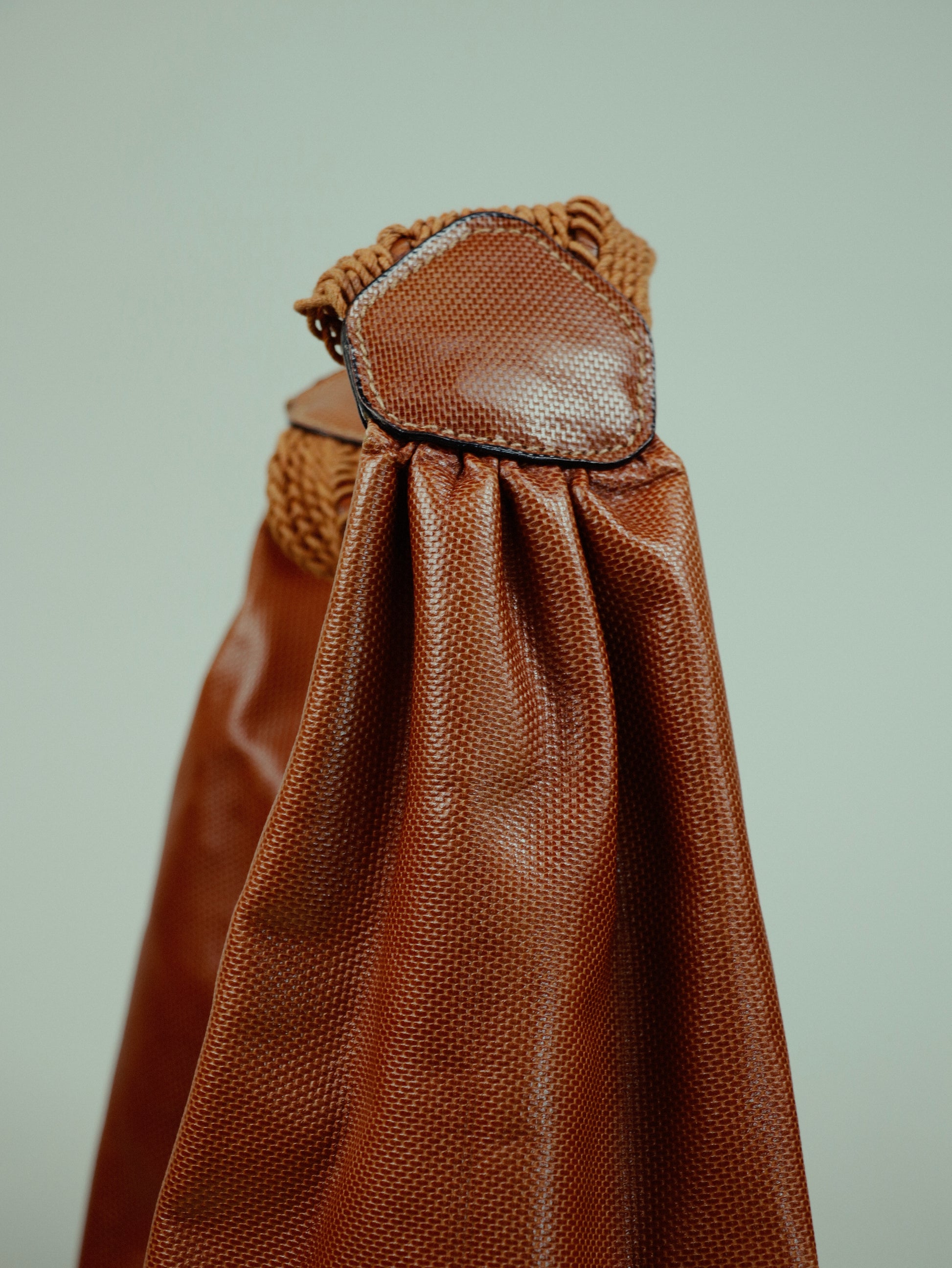 Hobo bag with woven handle