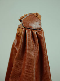 Hobo bag with woven handle