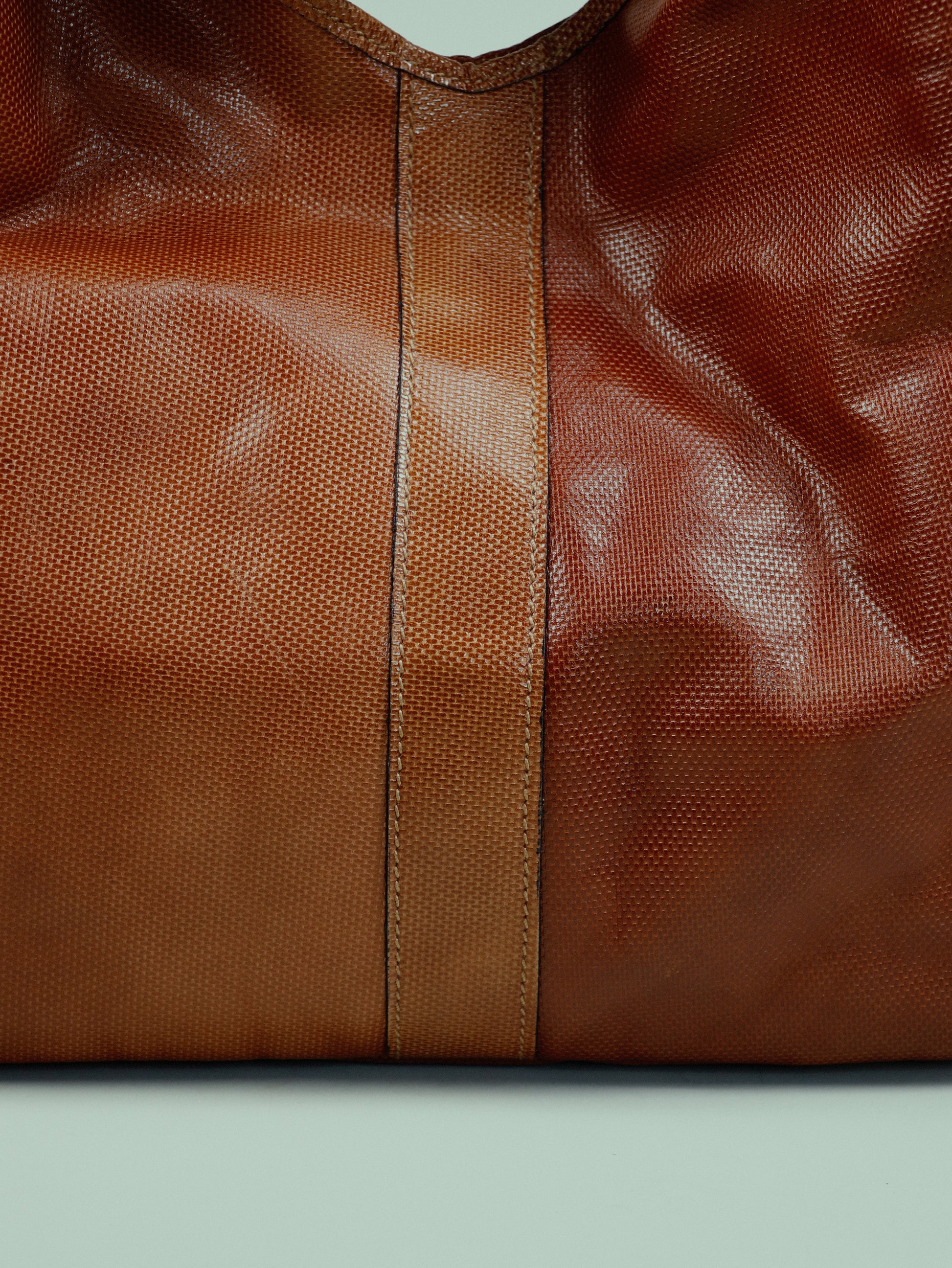 Hobo bag with woven handle